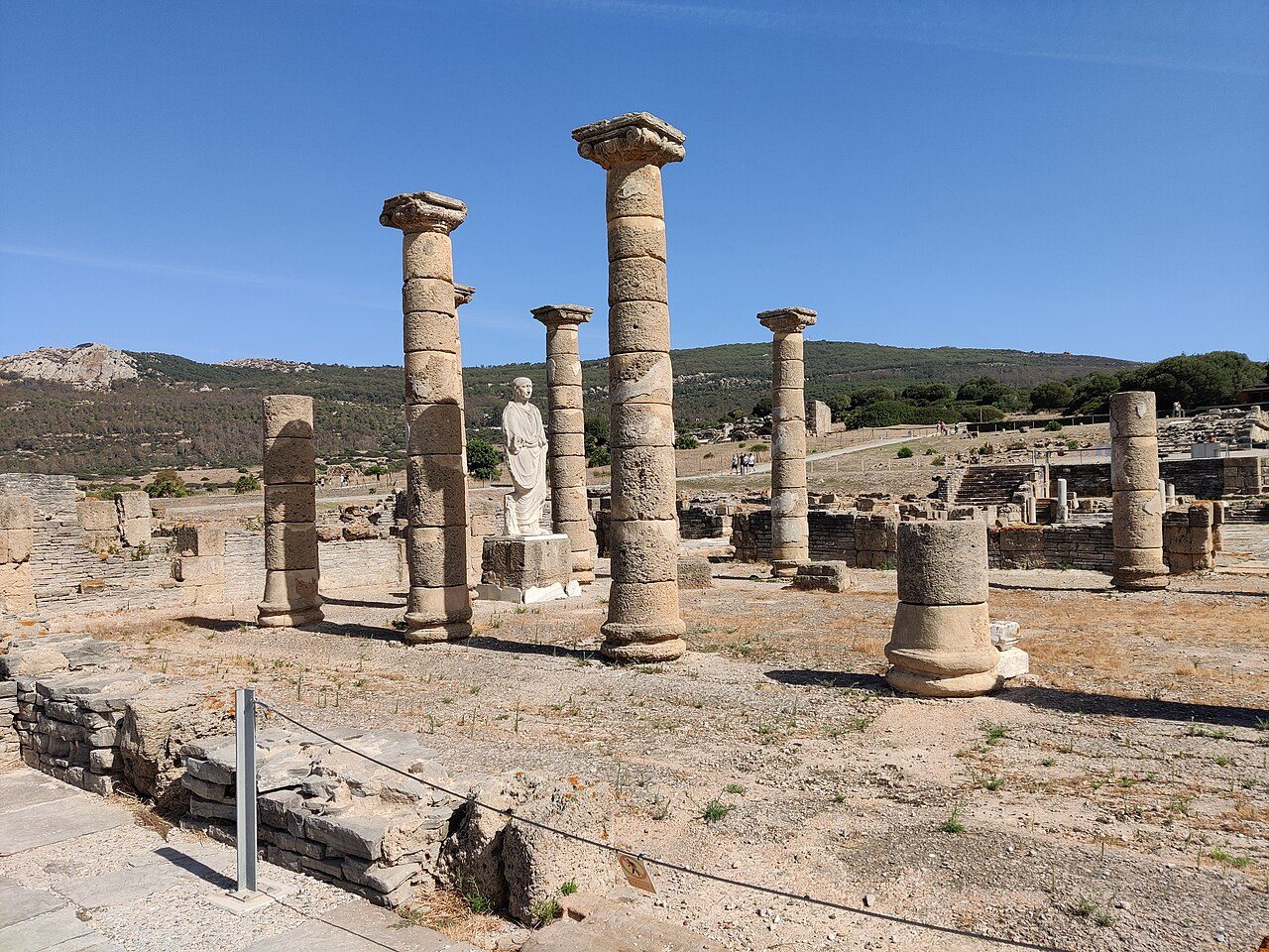 Roman columns of the Baelo Claudia archaeological site beside Bolonia beach